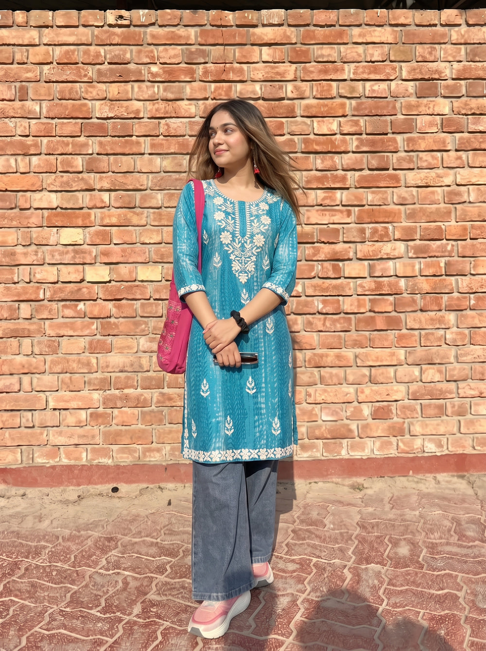 Alea Teal Blue Embroidered Top candid styled view – The Suitable