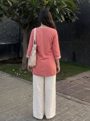 Sara Peach Embroidered Top back view – The Suitable