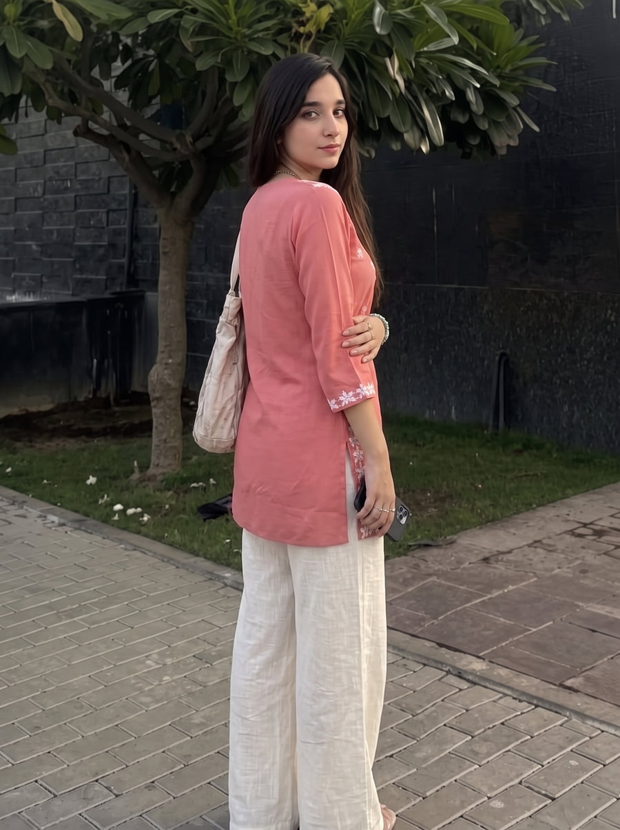 Sara Peach Embroidered Top over-shoulder styled view – The Suitable