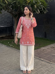 Sara Peach Embroidered Top candid styled view – The Suitable